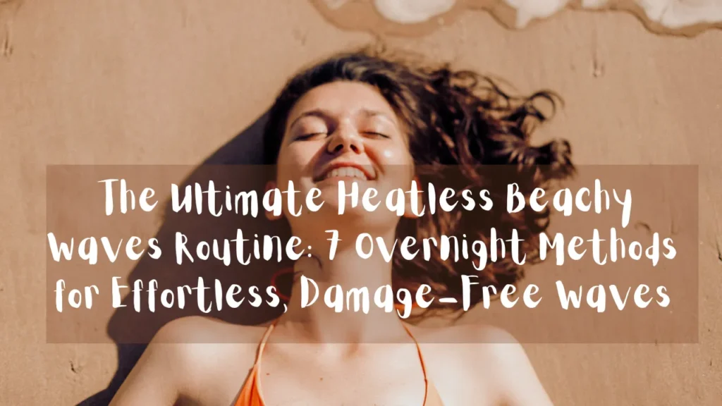 A horizontal photograph designed for a blog post or social media graphic, as referenced in the file The Ultimate Heatless Beachy Waves Routine 7 Overnight Methods for Effortless, Damage-Free Waves.webp. The image is an overhead shot showing a young woman smiling with her eyes closed, lying flat on her back on a sandy beach while wearing an orange bikini top. Her long, dark wavy hair is spread out above her head on the wet sand, near faint traces of sea foam. A semi-transparent brown overlay spans across the middle of the image, featuring the text "The Ultimate Heatless Beachy Waves Routine: 7 Overnight Methods for Effortless, Damage-Free Waves" written in a bold, white, handwritten-style font.