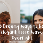 A horizontal graphic layout split into two distinct photographic panels, as referenced in the file 5 Dreamy Ways to Get Elegant Loose Waves Overnight (1).jpg. Centered across both panels, a semi-transparent grey text bar showcases large white handwritten-style text that reads: "5 Dreamy ways to Get Elegant Loose waves Overnight". The panels include: Left Panel: A rear view of a woman with long, vibrant auburn hair styled in a braided half-up look. She sits facing away from the camera in a white dressing room setup, looking toward a large, ornate white oval mirror that catches her reflection. Right Panel: A close-up portrait of a woman with long dark brown hair looking over her bare shoulder with a direct, intense expression. She is wearing dark eye makeup and a dark top against a softly blurred outdoor background.