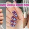 A three-panel collage showcasing various gel nail designs with pink text overlay reading "25 Dreamy Glazed Donut Nails Ideas." Left image shows glossy deep burgundy nails with a cherry accent; center features shimmering metallic purple chrome nails; right panel shows milky white square glazed donut nails.