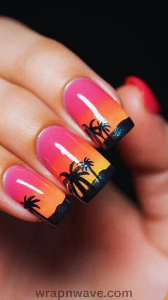 Close-up of square-shaped nails featuring a vibrant tropical sunset gradient in shades of bright pink, orange, and yellow, detailed with black silhouetted palm trees standing on dark sand along the tips.